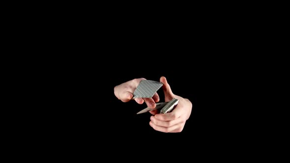 Talanted Magician Starts Showing His Trick with Cards, Cardistry on Black alt