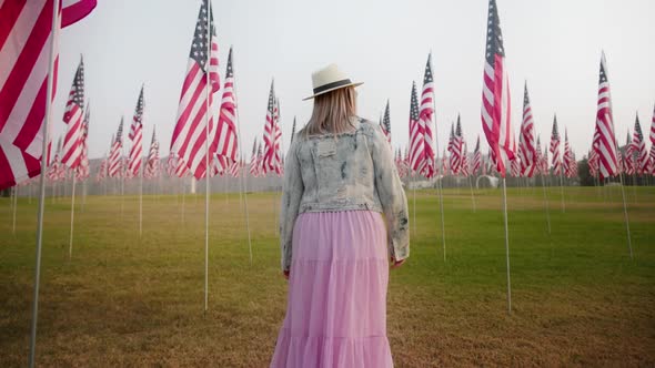 Camera Following Young Woman Walking By September 11Th Memorial Display Malibu alt
