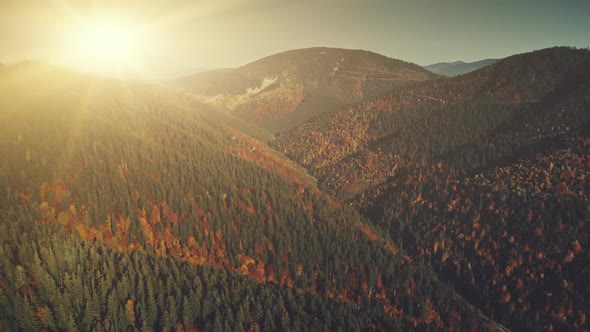 Multicolored Hill Chain Peak Sun Beam Aerial View alt