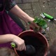 Happy Preschool Little Girl Kid Daughter Wear Works Gloves Humic Boots Planting Flowers in Pot in 