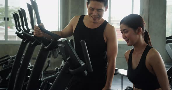 Man and woman exercise at fitness alt