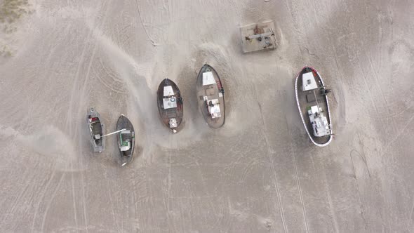 Old Fishing Boats Ashore on Thorup Strand Beach in Denmark alt