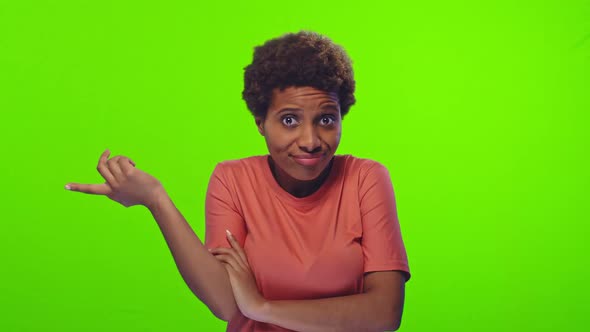 Black Woman Gesturing on Chroma Key Background, Asking Are You Crazy alt