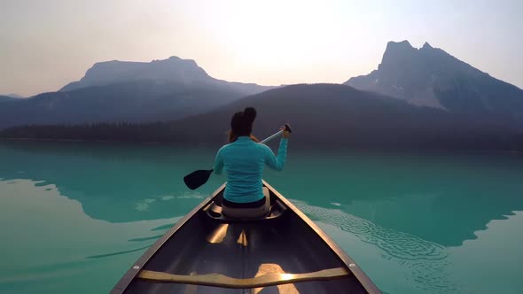 Man travelling on boat in lake 4k alt