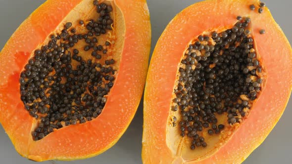 Top View of Ripe Half Cut Papaya. Healthy Summer Food Concept with Tropical Fruits, Flat Lay alt