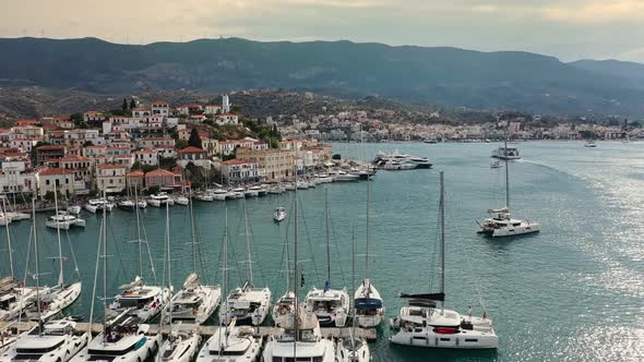 Aerial View of Poros Old Town and Marina or Seaport Greece  Drone Videography alt