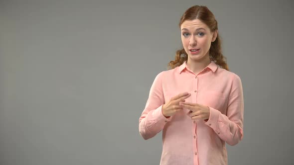 Female Asking What Is Your Name in Sign Language, Showing Words in Asl Lesson alt