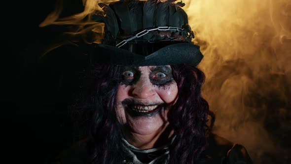 Creepy Scary Mature Woman Grandmother with Halloween Stylish Witch Makeup Making Terribly Faces alt