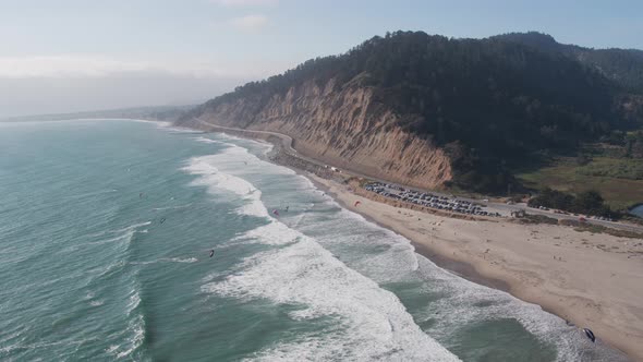 Aerial Drone Shot of a Beach Kiteboarders and Windsurfers (Waddell Beach, Pacific Coast Highway, CA)
