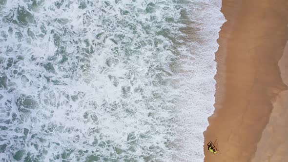 Aerial view top down of Local southern Thai fisherman uses his handmade fish trap and cicada sea alt