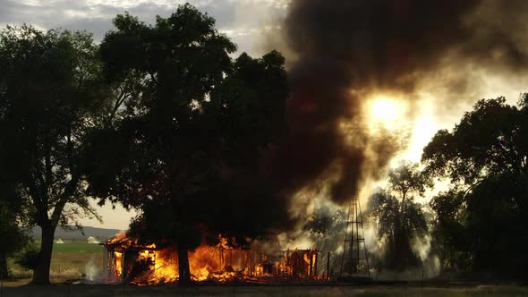 House on fire burning in slow motion alt