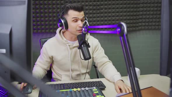 Funny Professional Radio Host with Headphones on Fun Live Streaming alt