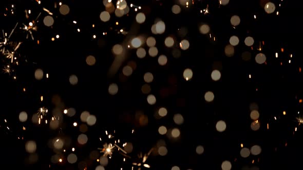 Super Slow Motion Shot of Sparkler Isolated on Black Background at 1000Fps alt