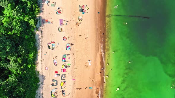 Top down view of crowded beach on Baltic Sea alt