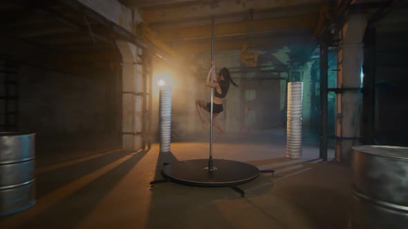 Beautiful Dancer On A Pole Performs A Scorpion Trick. Cyberpunk Style alt