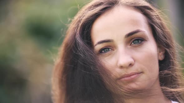 Beautiful Caucasian Woman Smiling at Camera.