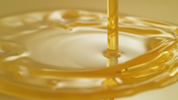 Pouring olive oil. Slow Motion. alt