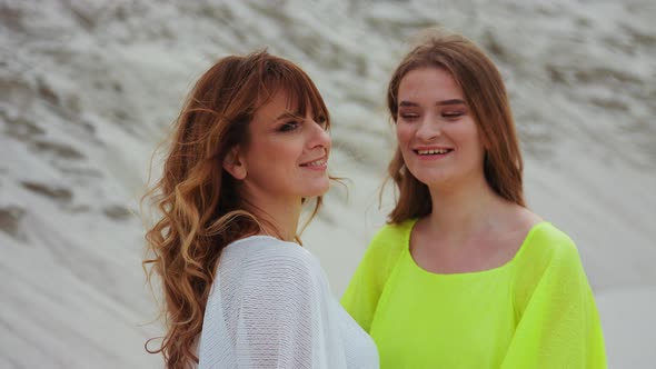 Two Young Smiling Women in Summer. Females Showing Positive Face Emotions alt