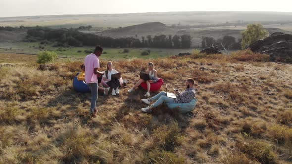 Freelancers Work in Aerial View and Vigorously Discuss New Concept of the Project Development Plan alt