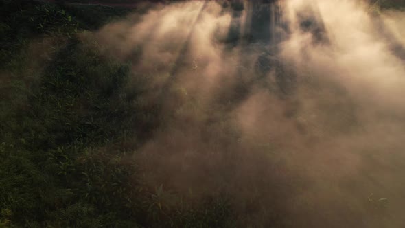 4K Aerial view of Mountains landscape with morning fog. alt