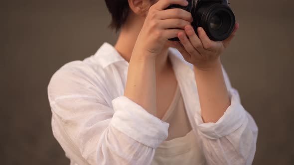 woman taking pictures alt