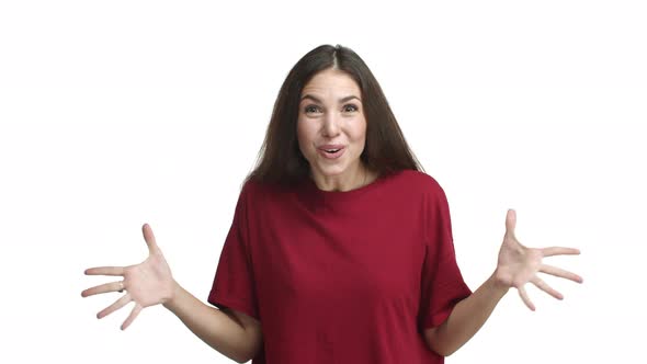 Video of Happy Excited Female Model in Red Tshirt Reacting to Super Good News Screaming for Joy and alt