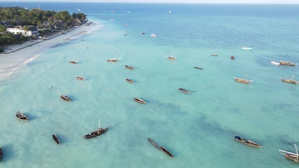 Coastal Landscape of Zanzibar Tanzania  Boats Near the Shore alt