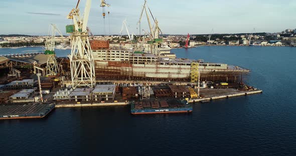 Aerial view of Pula harbour and a shipyard, Pula, Istria, Croatia. alt