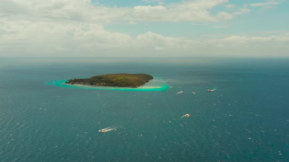 Tropical Island in the Open Sea alt