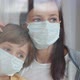 Family in Protective Masks Quarantined at Home - VideoHive Item for Sale