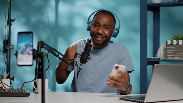 Social Media Influencer Giving Good News to Subscribers alt