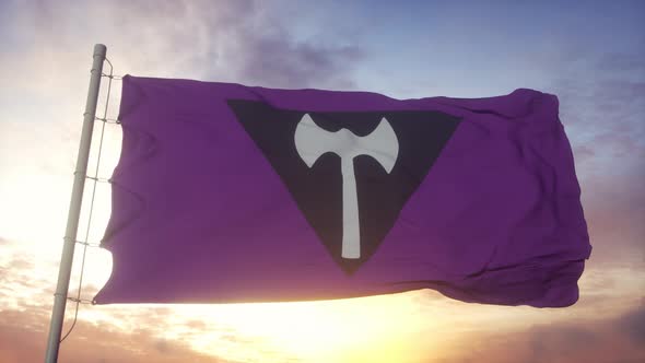 Labrys Lesbian Pride Flag Waving in the Wind Sky and Sun Background alt