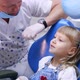 Little child in stomatology chair - close up. Girl with dentist. Health teeth concept. - VideoHive Item for Sale
