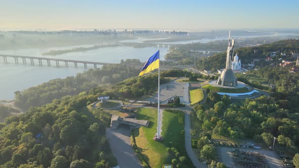 Ukrainian Flag in the Morning at Dawn. Aerial. Kyiv. Ukraine alt