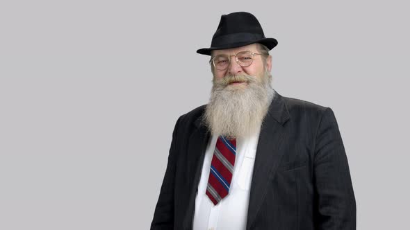 Aged Senior Man Showing Like Gesture alt