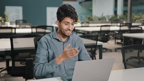 Millennial Man Indian Businessman Using Video Conference App Greeting Employees Waving Hand Hello alt