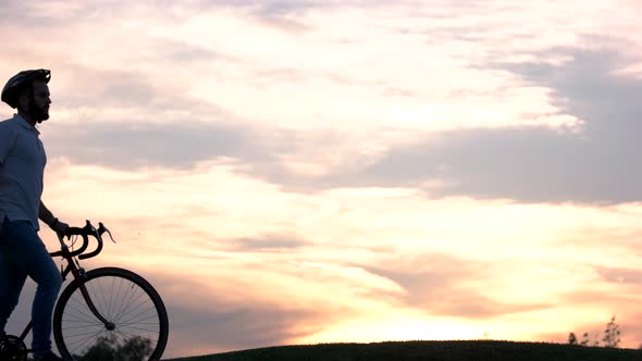Young Couple Walking at Sunset alt