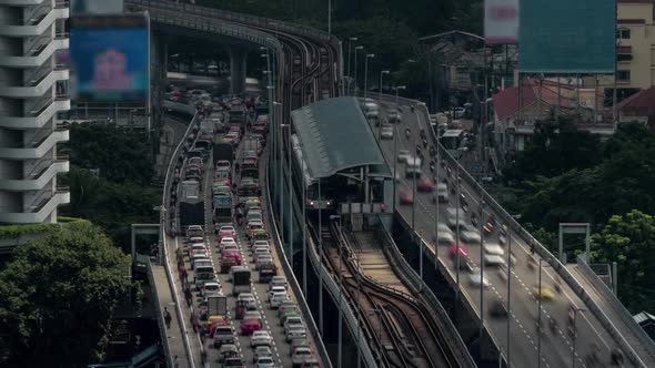 Time Lapse Shot of Multi-level Traffic Road, Railway and Train Station. Bangkok, Thailand alt