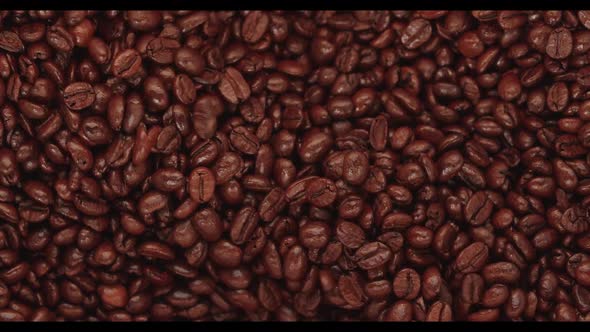 Top View of Coffee Beans Roasting in a Roaster alt