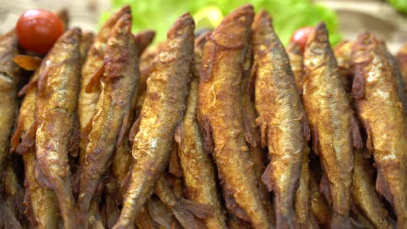Beautiful Smoked and Fried Fish in a Shop Window alt