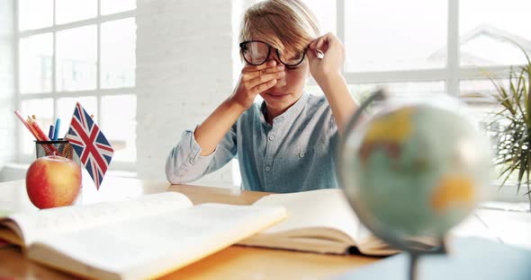 Tired Smart Boy Learning English