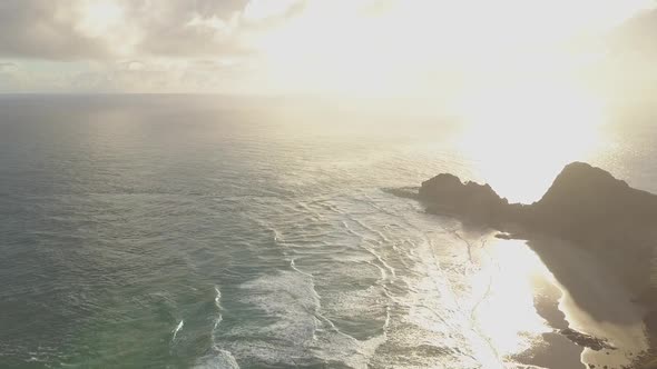 Aerial of Cape Reinga lighthouse in sunset
