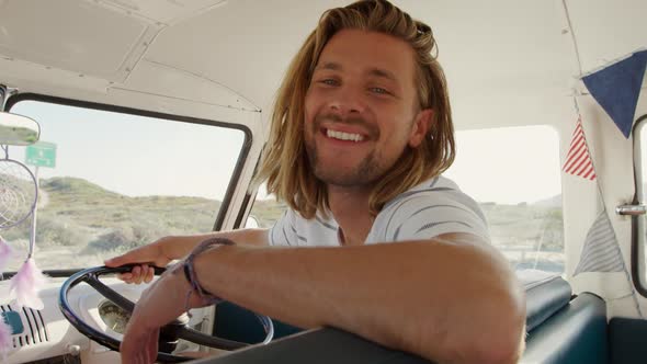 Camper van road trip by the sea alt