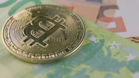 Golden Bitcoin Lies on Euro Banknotes alt