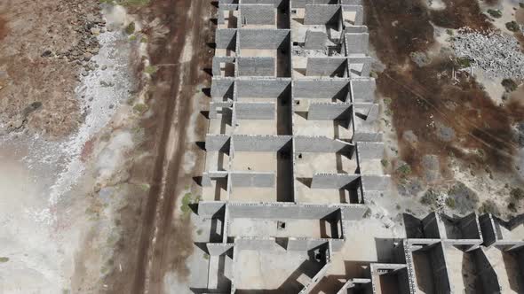 Aerial drone footage over a partly built hotel complex in the country of Cape Verde