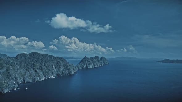 Blue Seascape with Mountainous Islands at Ocean Bay Aerial View