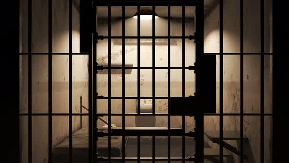 Old grunge dirty prison cell seen through jail bars. The dolly zoom effect. alt