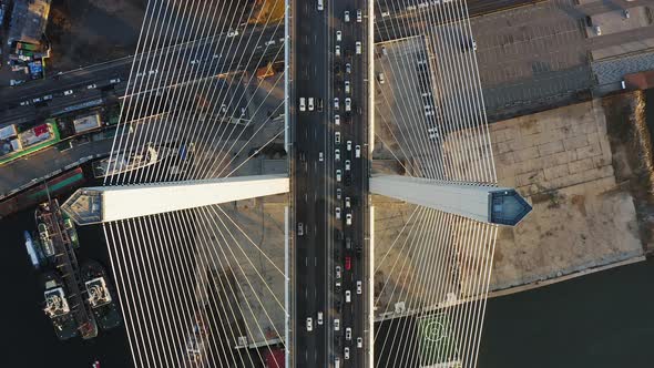 Vertically Down View on the Road with Dense Traffic of the Cablestayed Bridge alt