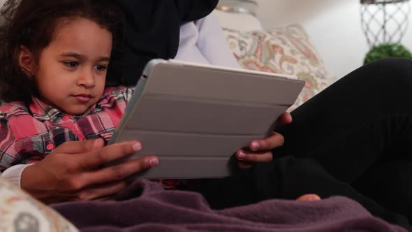 Mother and daughter at home alt
