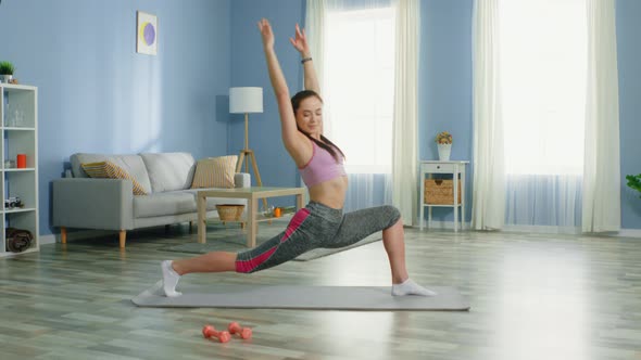 Young Woman Is Doing Quick Stretches alt